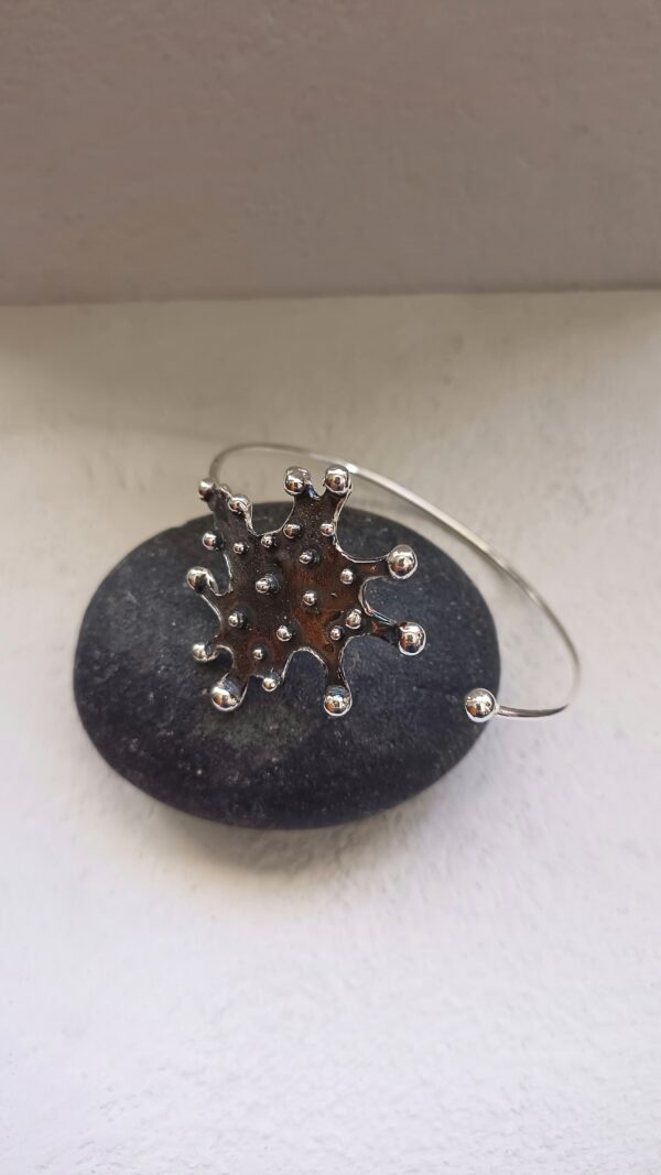 PULSERA "LLUVIA" RÍGIDA AJUSTABLE
